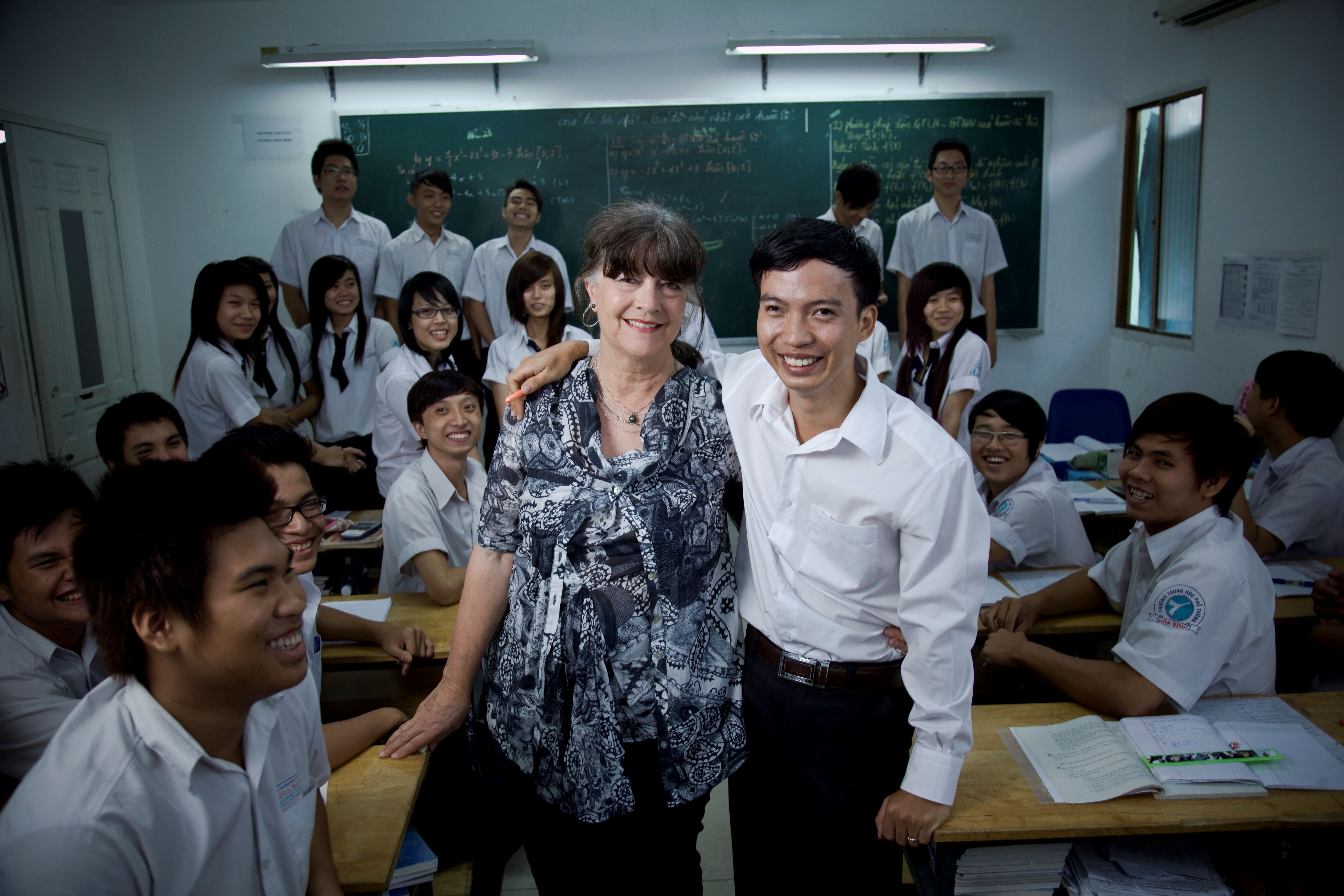 Gabi Hollows pictured with teacher Tran Van Giap in his year 12 mathematics class.