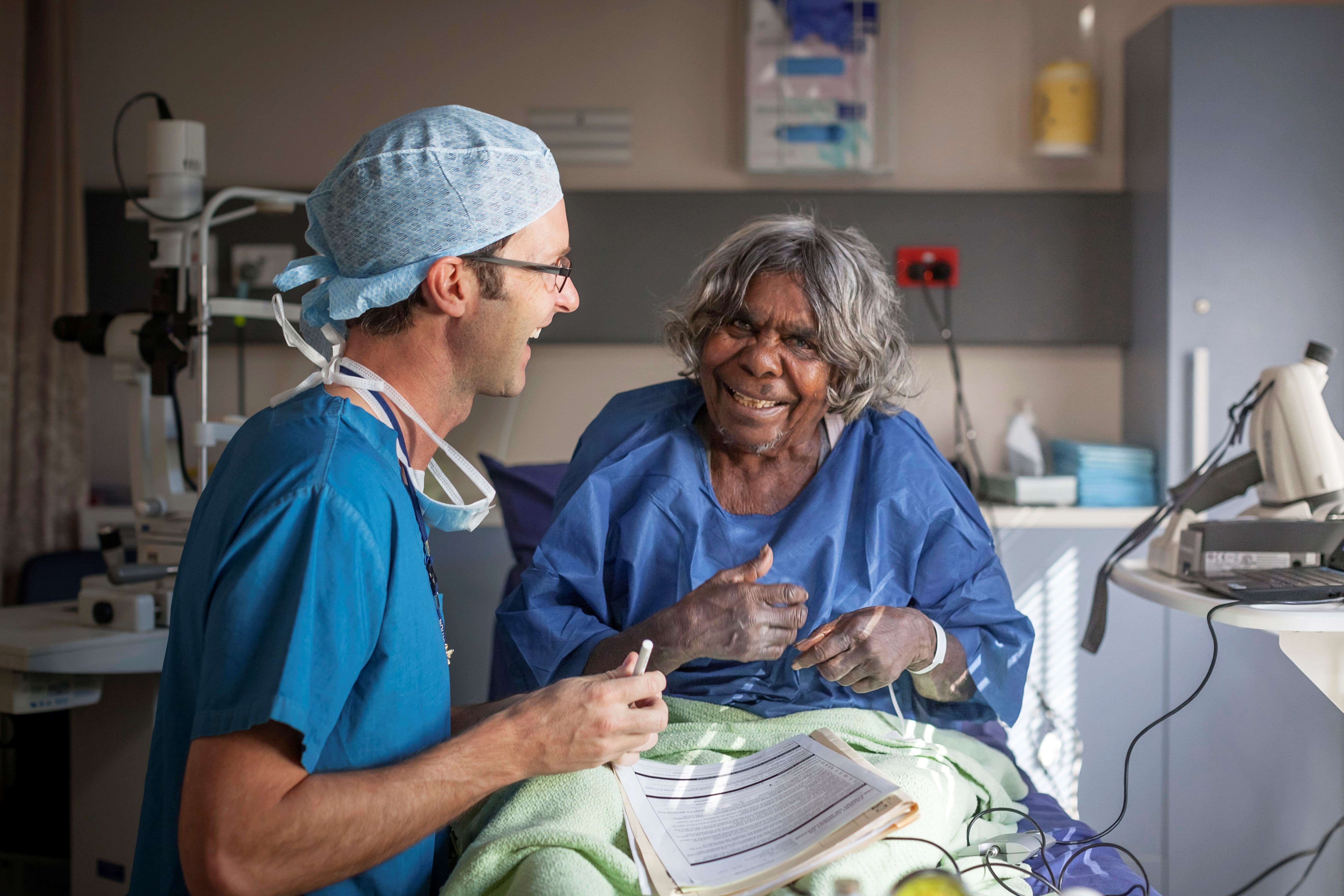 Associate Professor Angus Turner preparing Mavis Arnott for cataract surgery