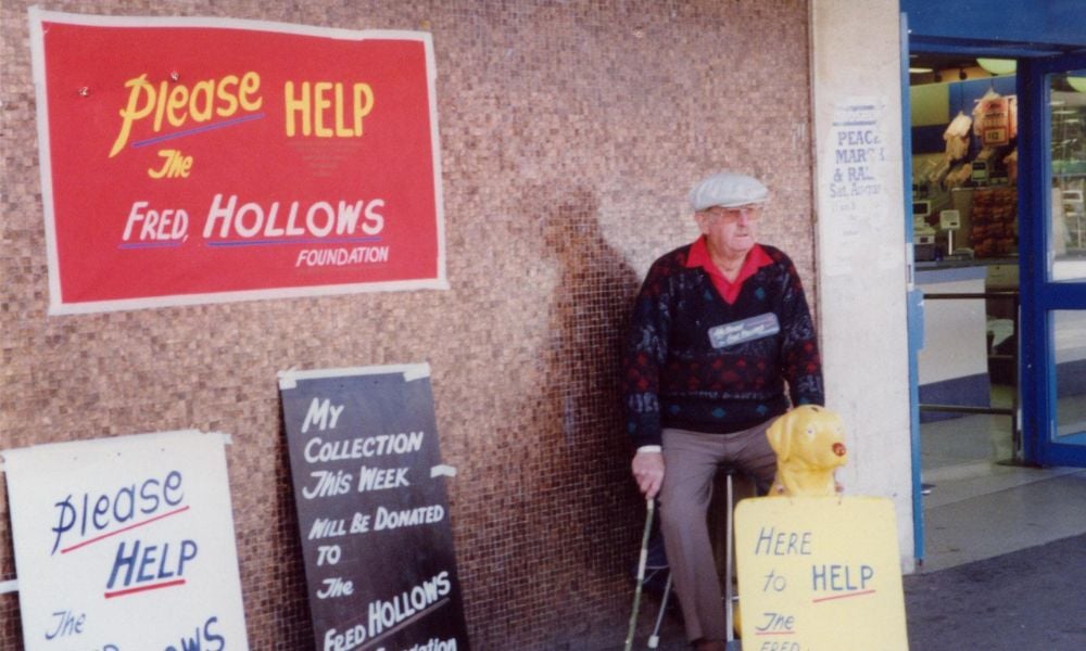 Photo of John fundraising outside a shop