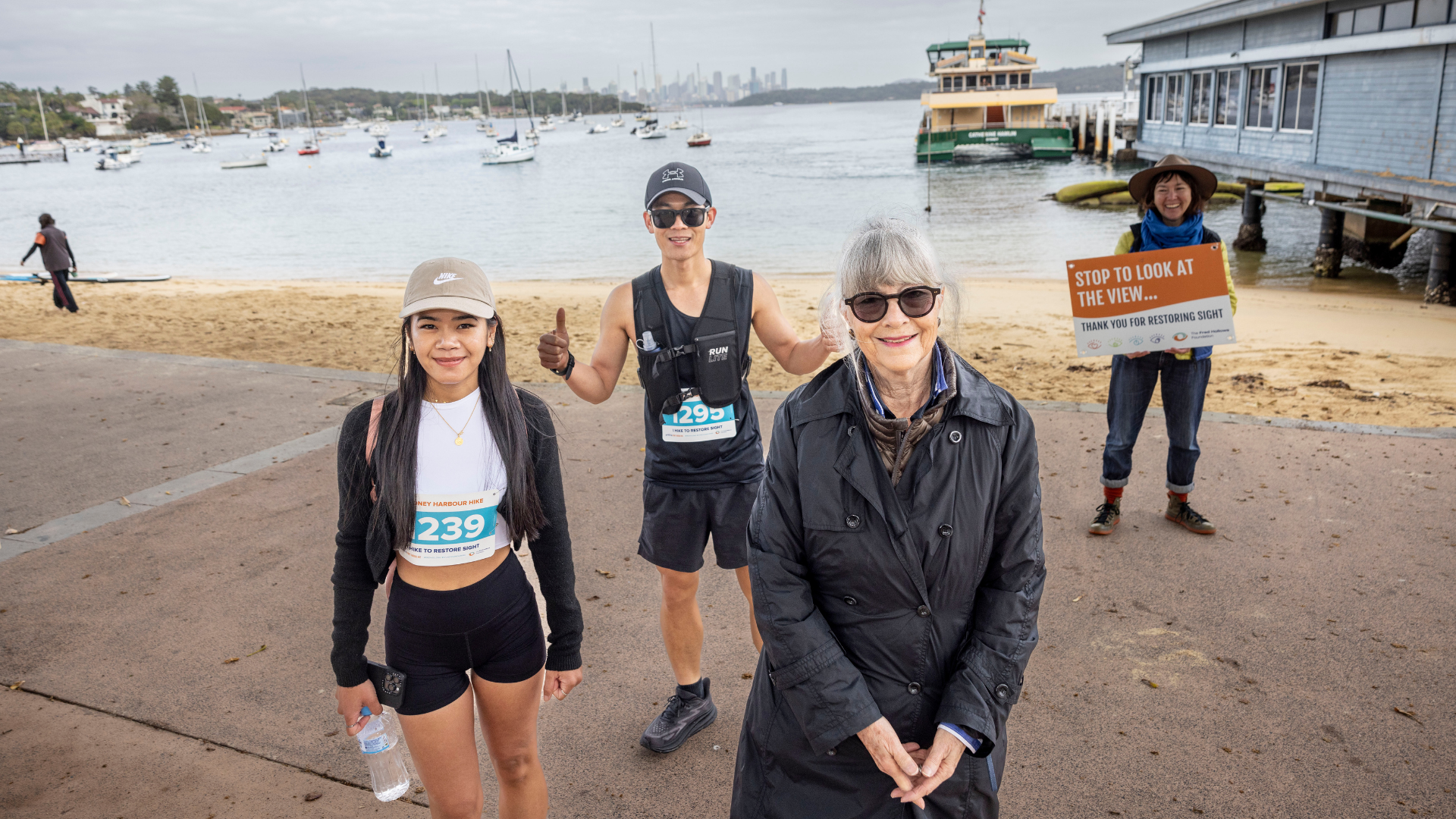 Gabi Hollows cheering on participants of the Sydney Harbour Hike