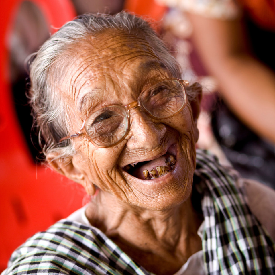 A patient from the Rakhaine Community after recieving glasses as part of World Sight Day 2011.