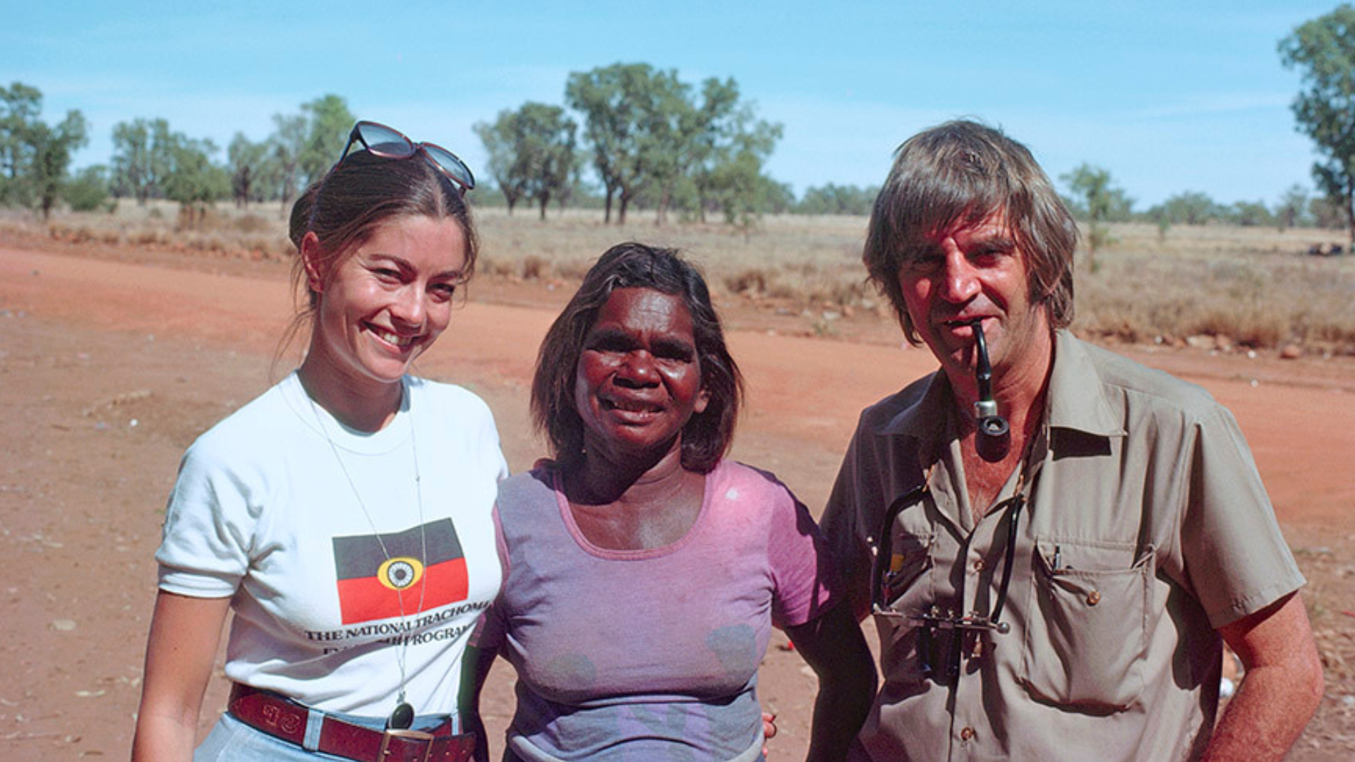 Fred and Gabi Hollows posing for a photo with Penny Luck