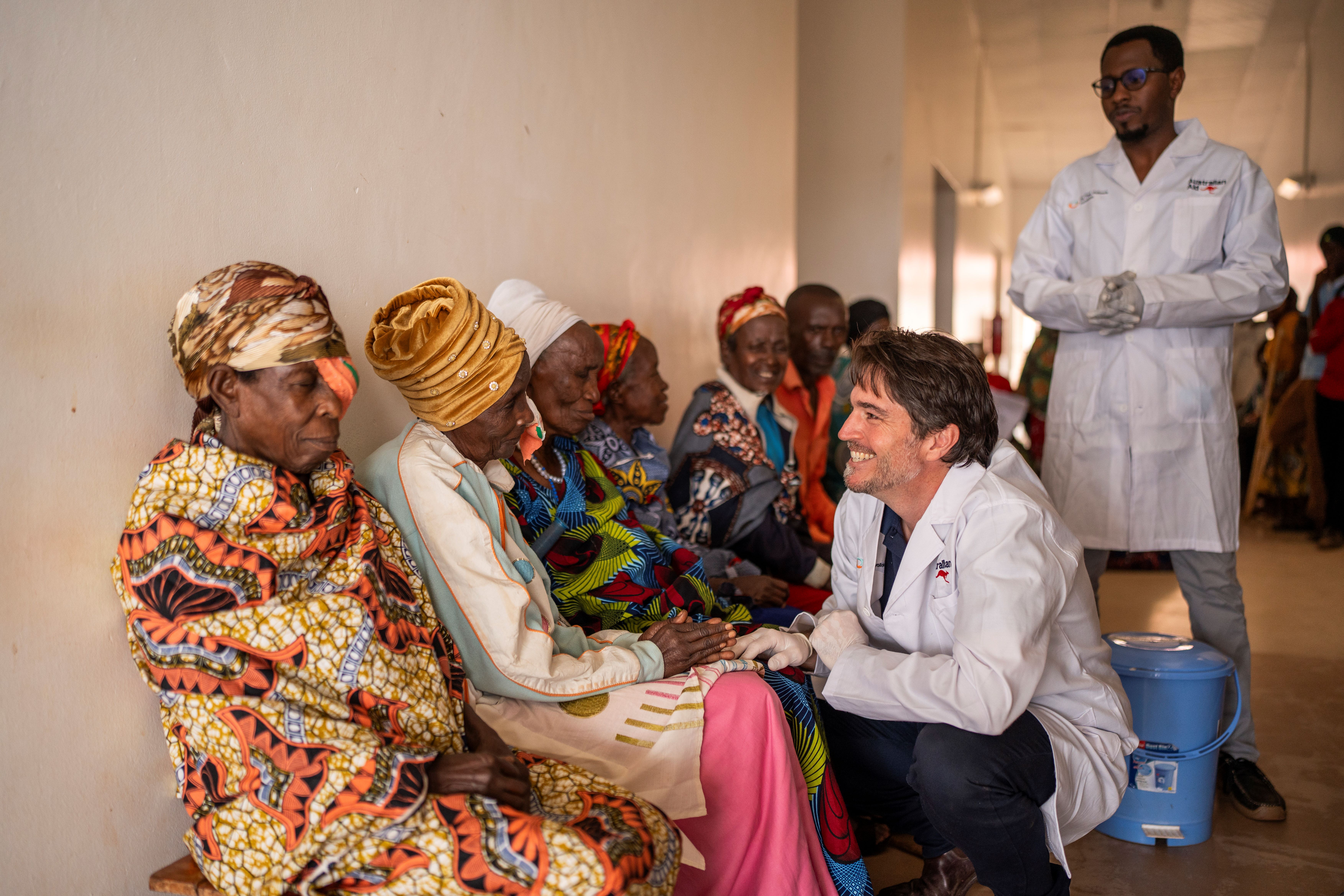 Cam in Rwanda a few months ago at Kibagabaga Hospital, meeting with patients who have just had their sight restored. 