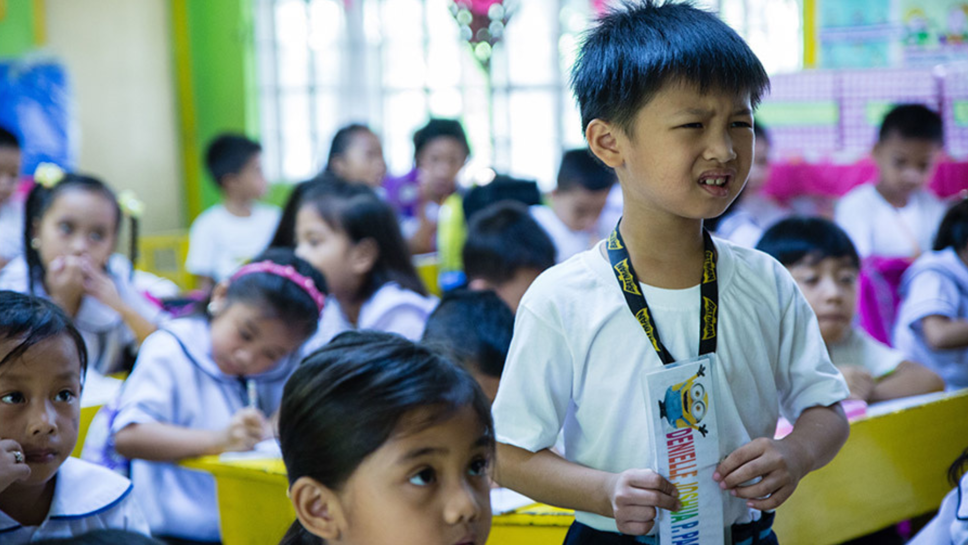 A boy in a classroom in the philippines