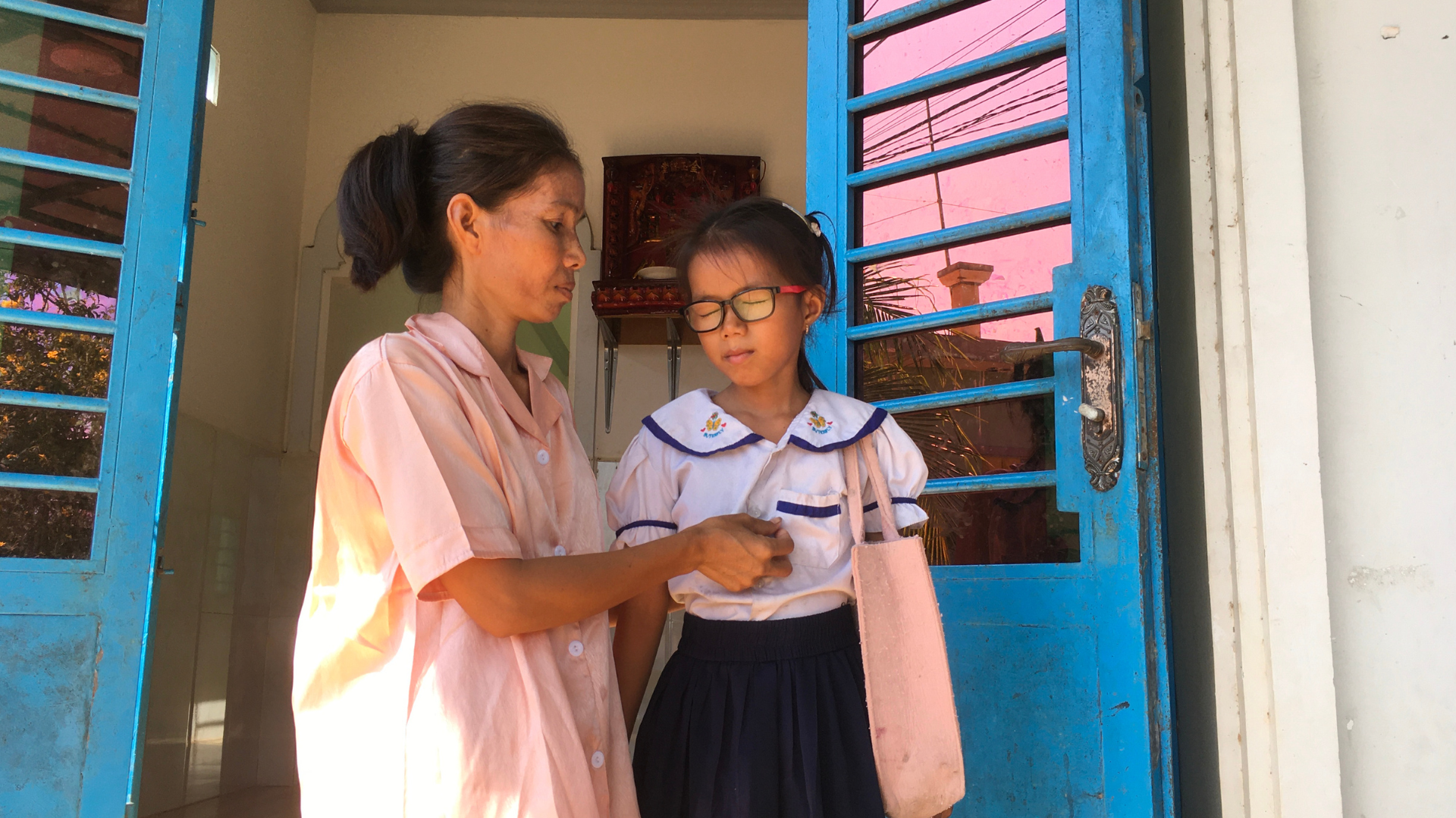 Sreyleap with her new glasses for uncorrected refractive error