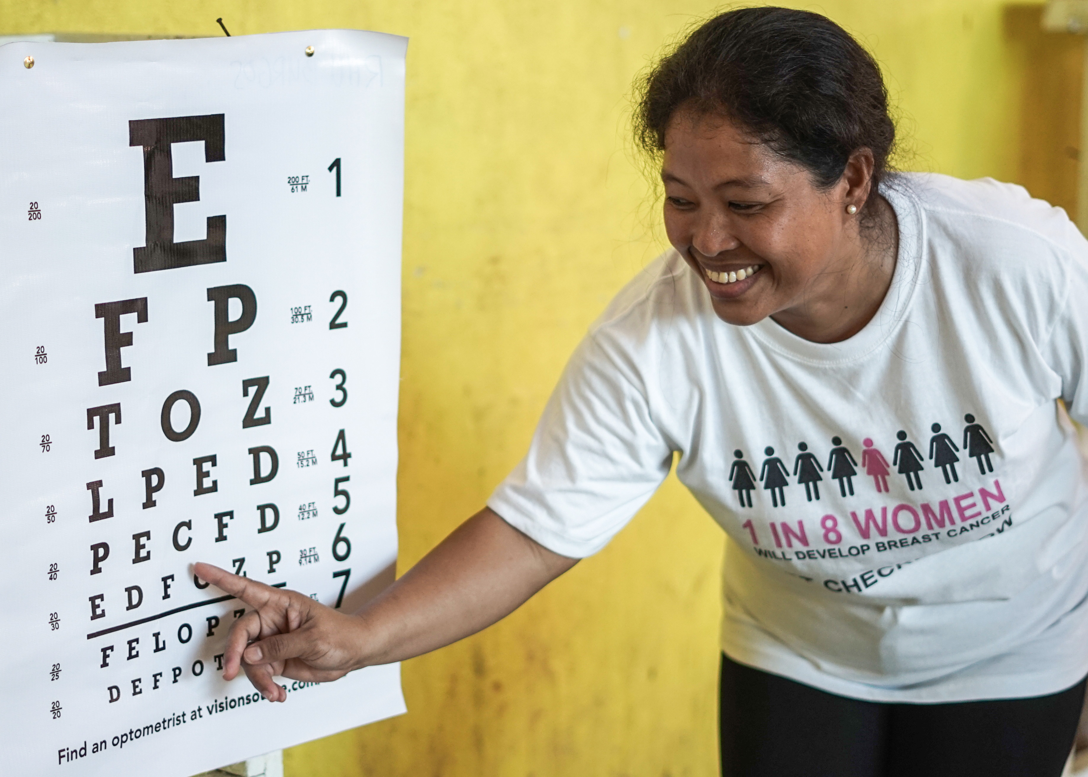 An eye chart in use at an outreach eye screening at the beaches of Siargao.