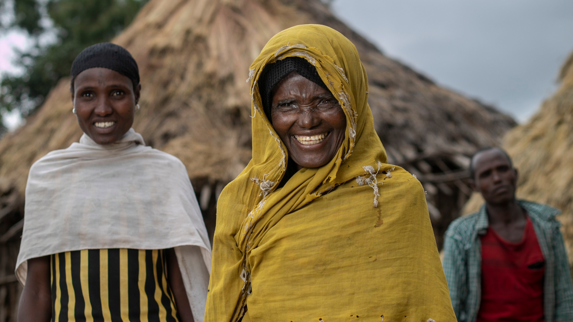 Hawiti from Ethiopia smiling at the camera after eye surgery