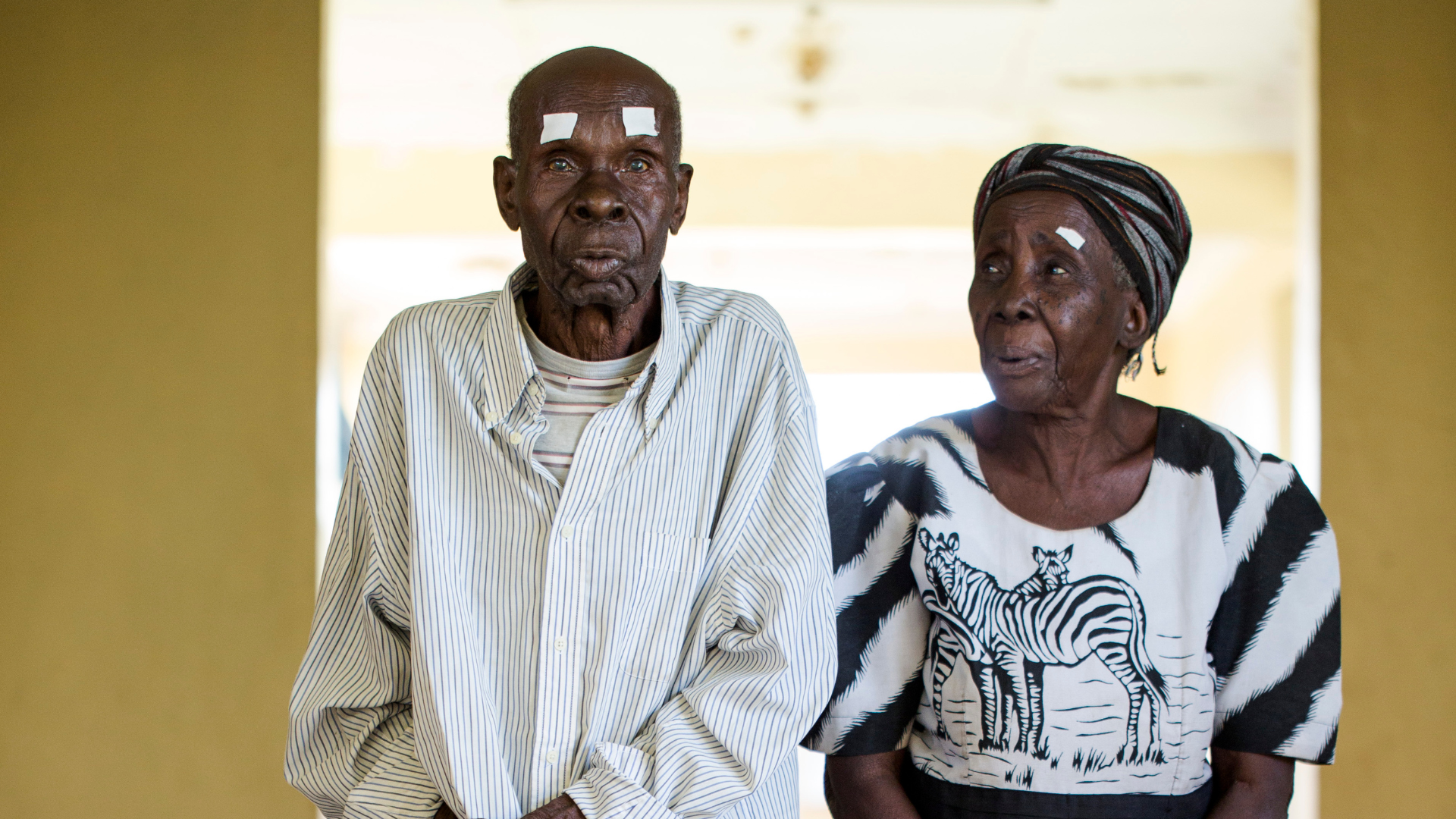 John and Hendricka walking side by side after surgery