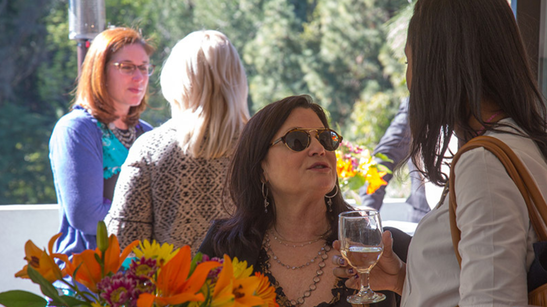 Two women talking at Joel Edgerton's fundraising event in LA