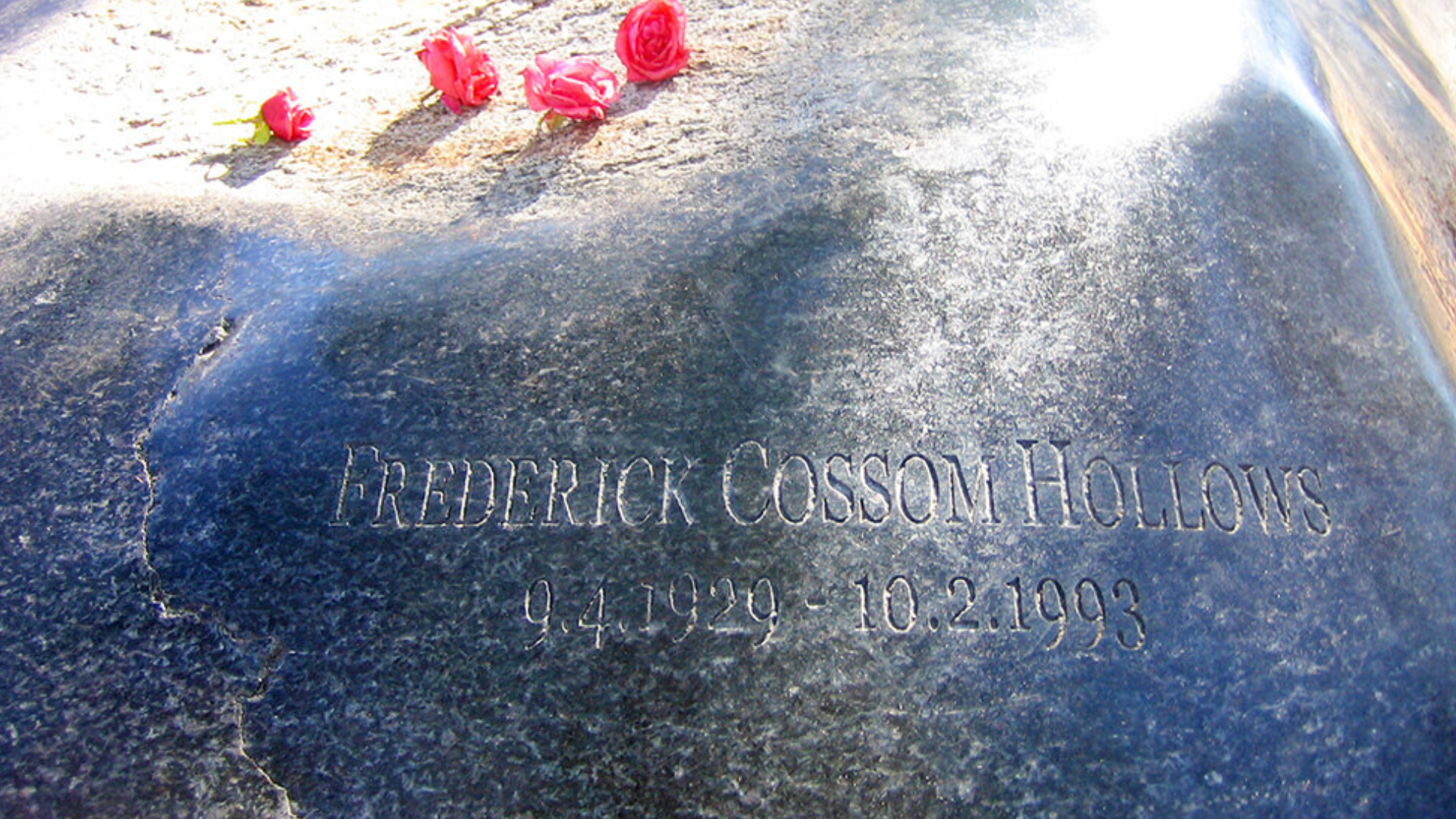 A close up of Fred Hollows gravestone with his birth and death date