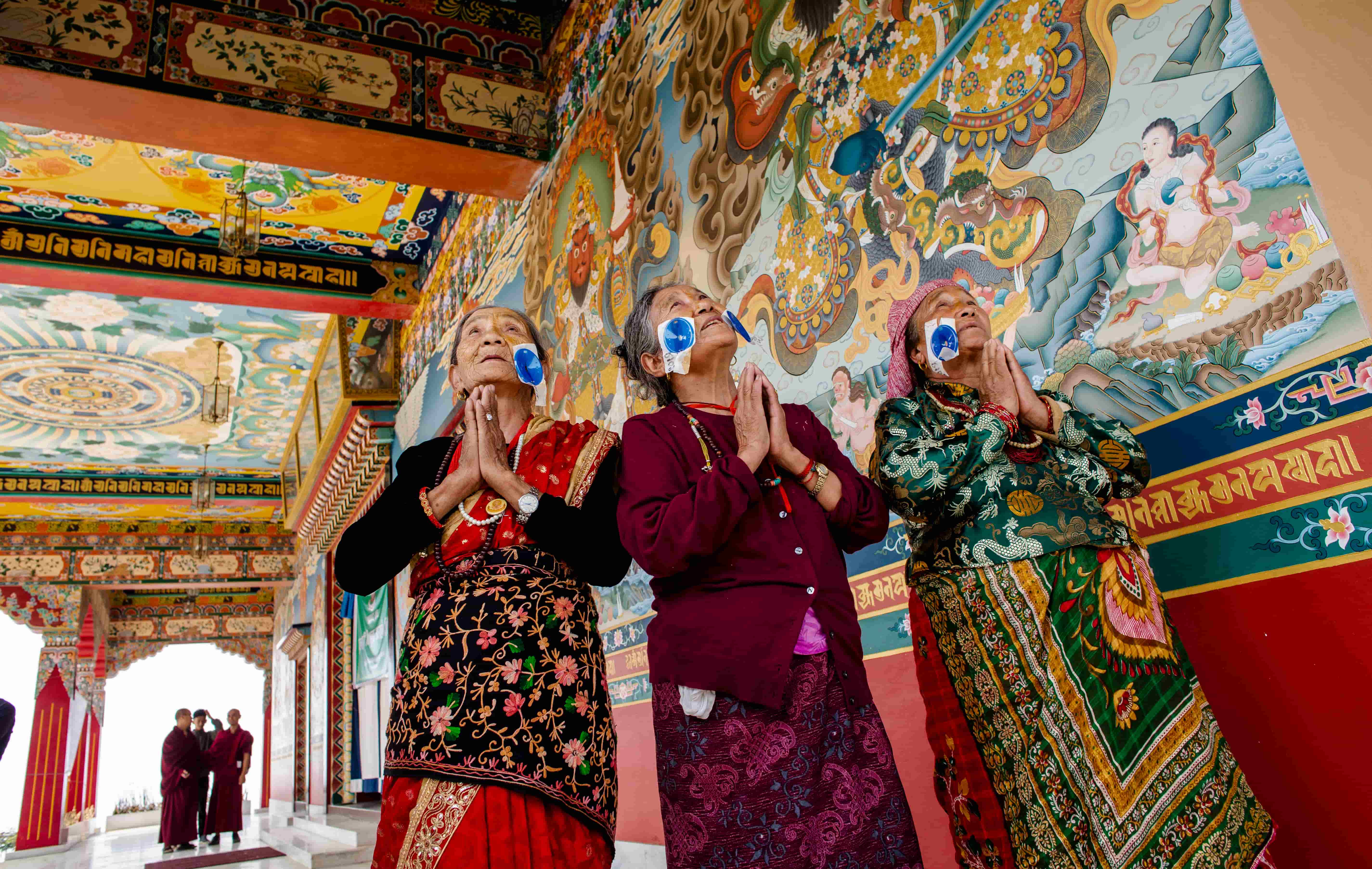 Chini Lama, 74, at Pullahari Monastery Eye Camp accompanied by her two childhood friends, Tashi Dolma, 70, and Suna Lama, 80.