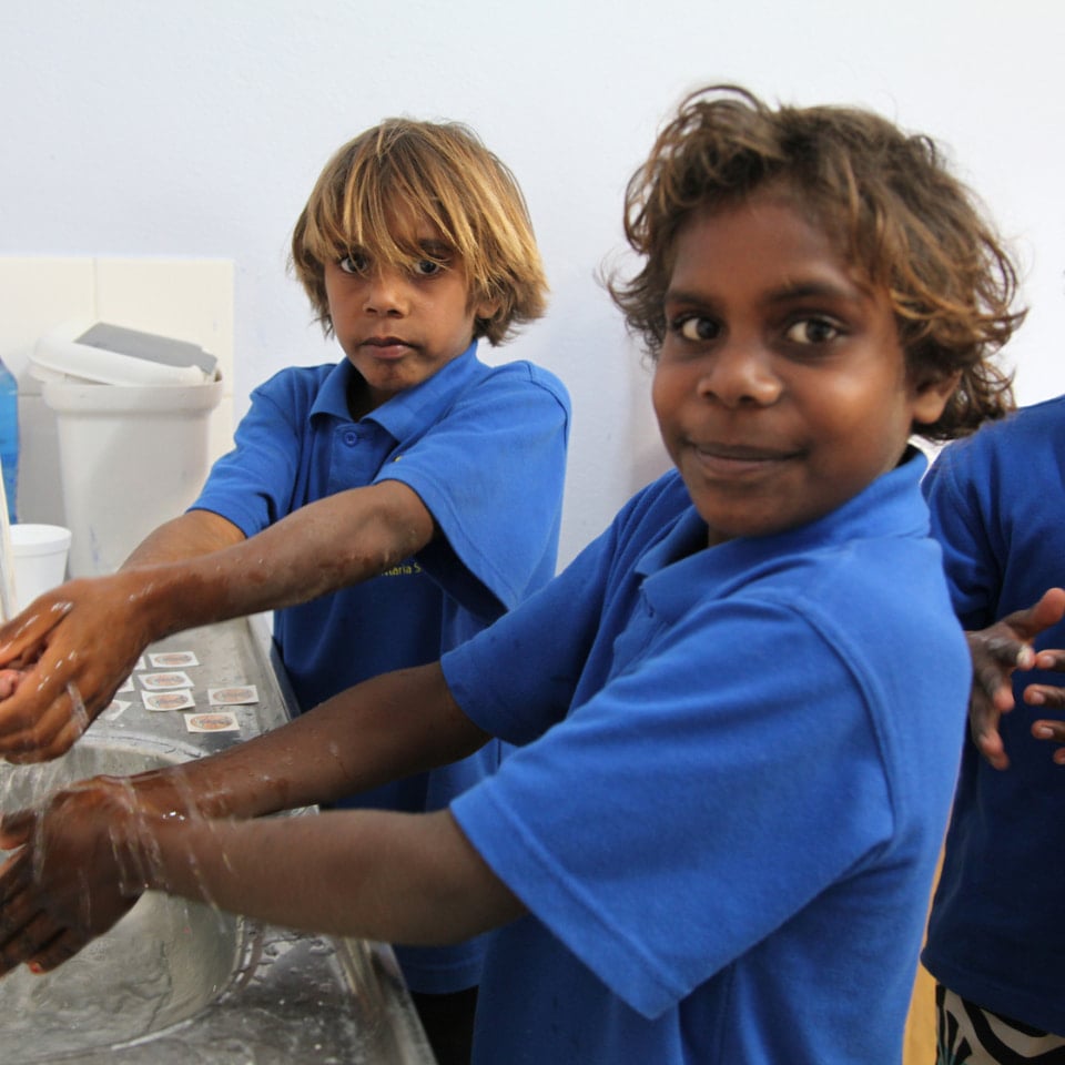 School children washing their hands