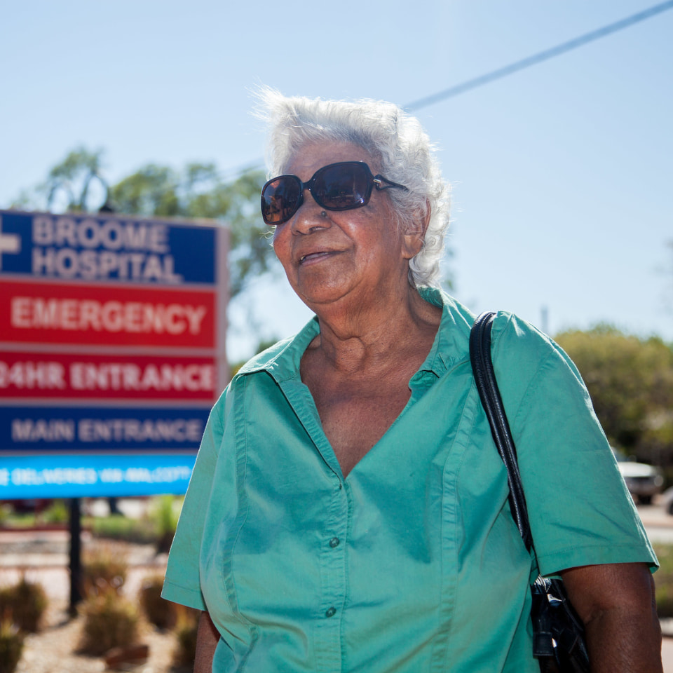 Women standing outside hospital