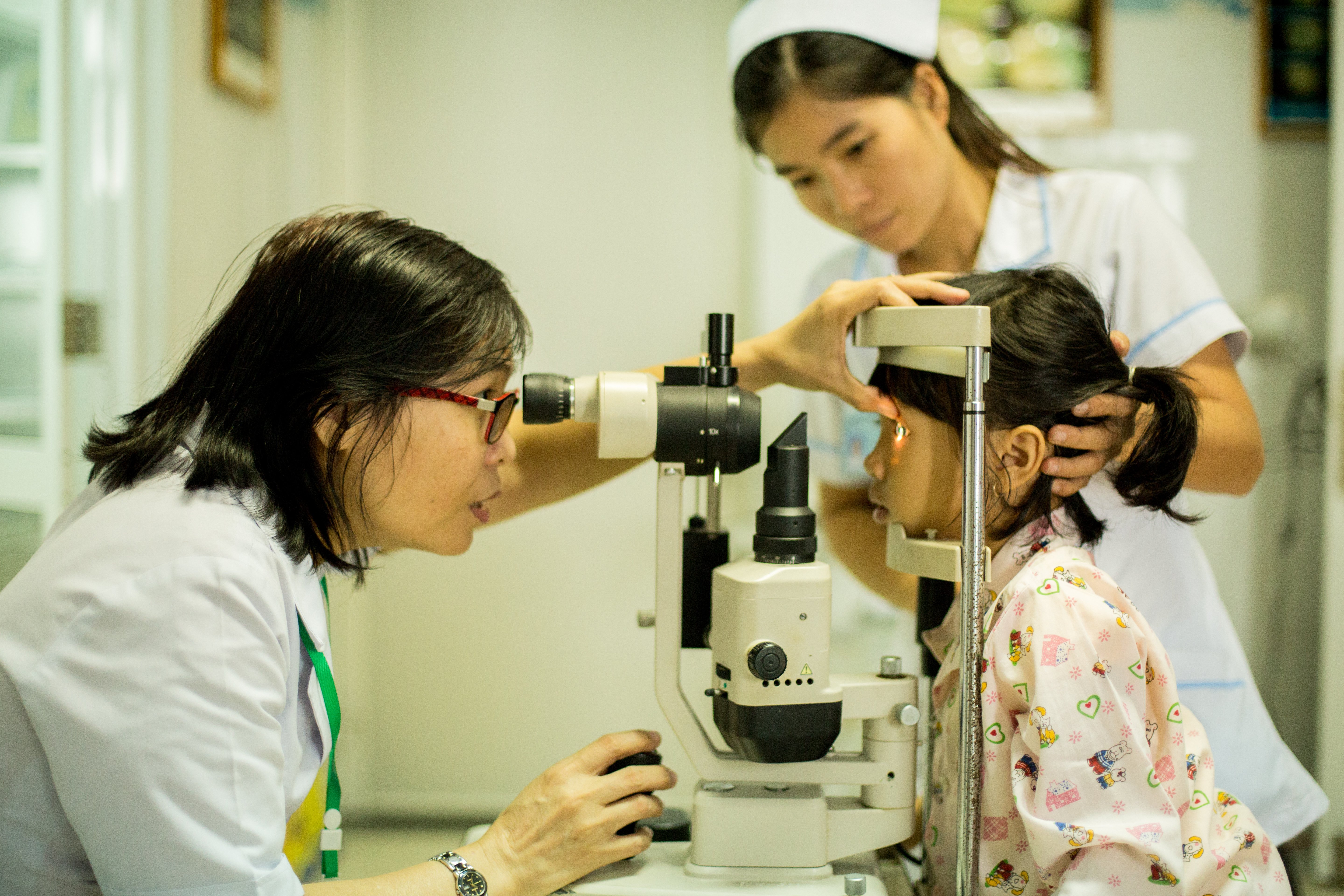 Cam having her eyes tested